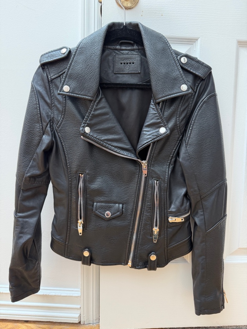Black Leather Moto Jacket with Silver Hardware